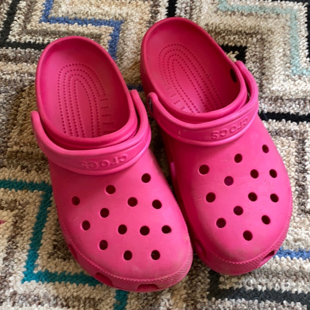 Hot pink Crocs.